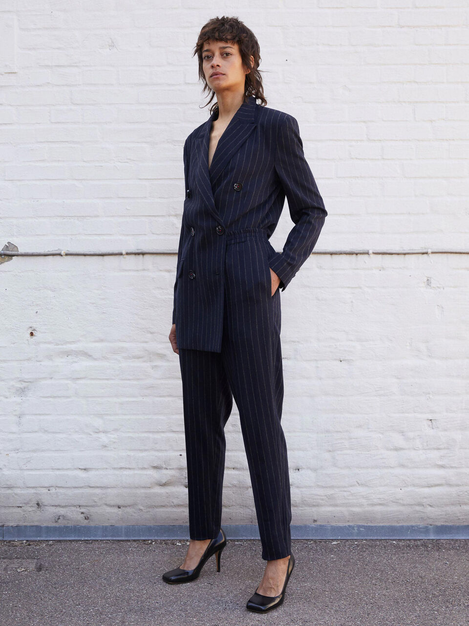 red pinstripe trousers