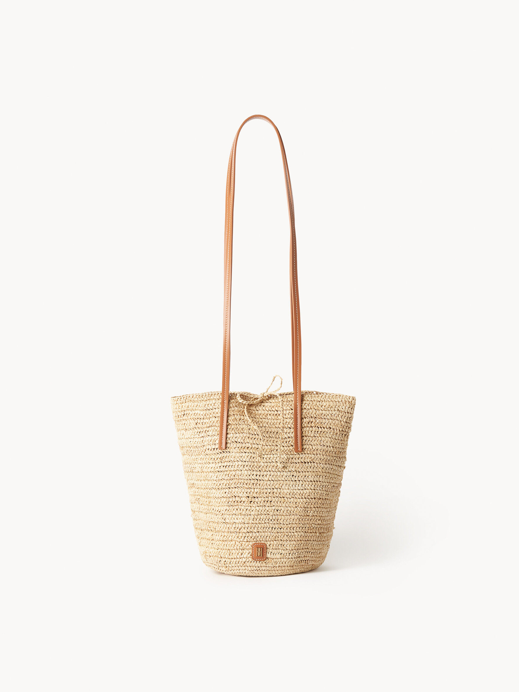 Shoulder straw outlet bag