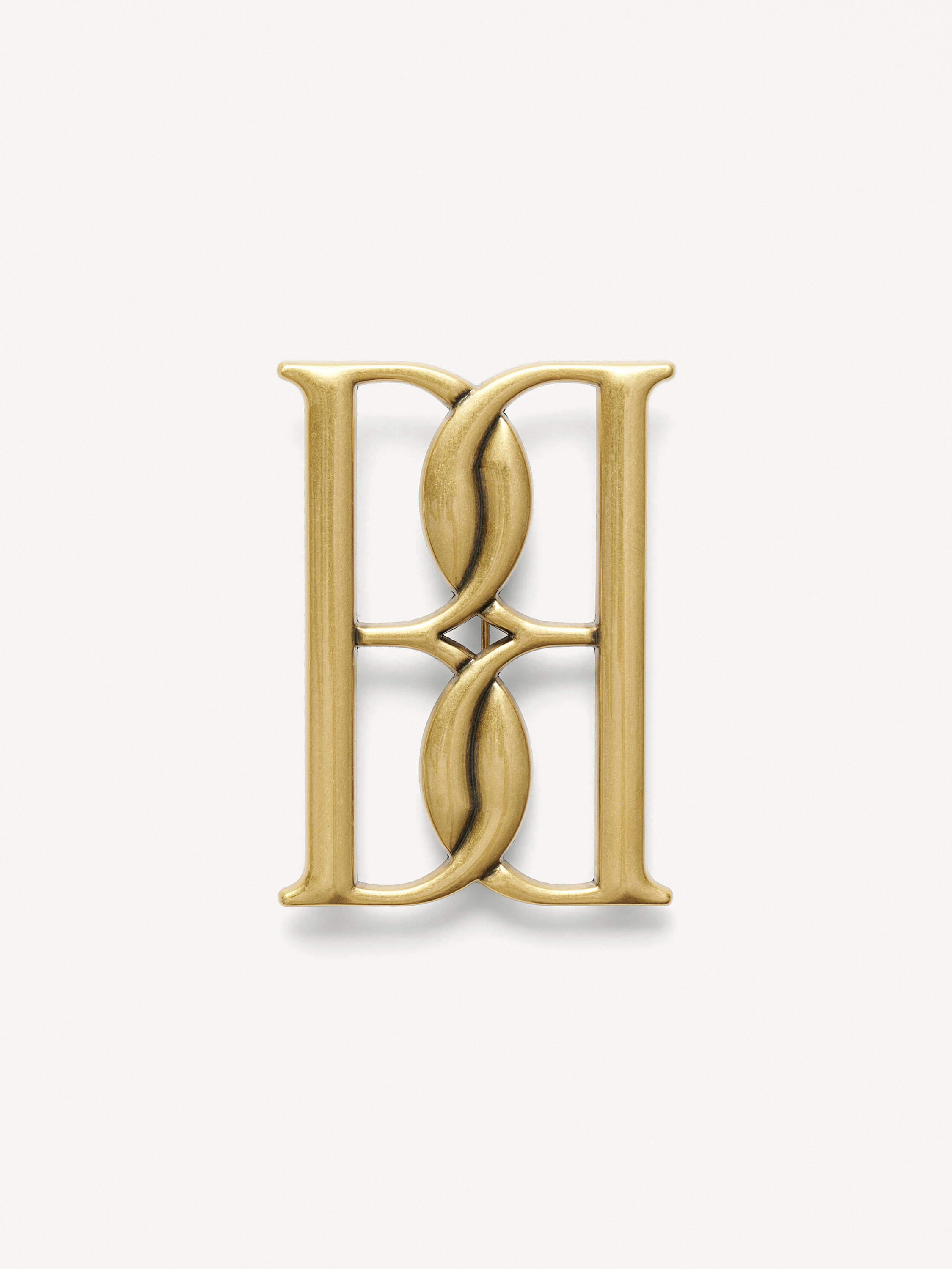 Mono large gold-tone brooch