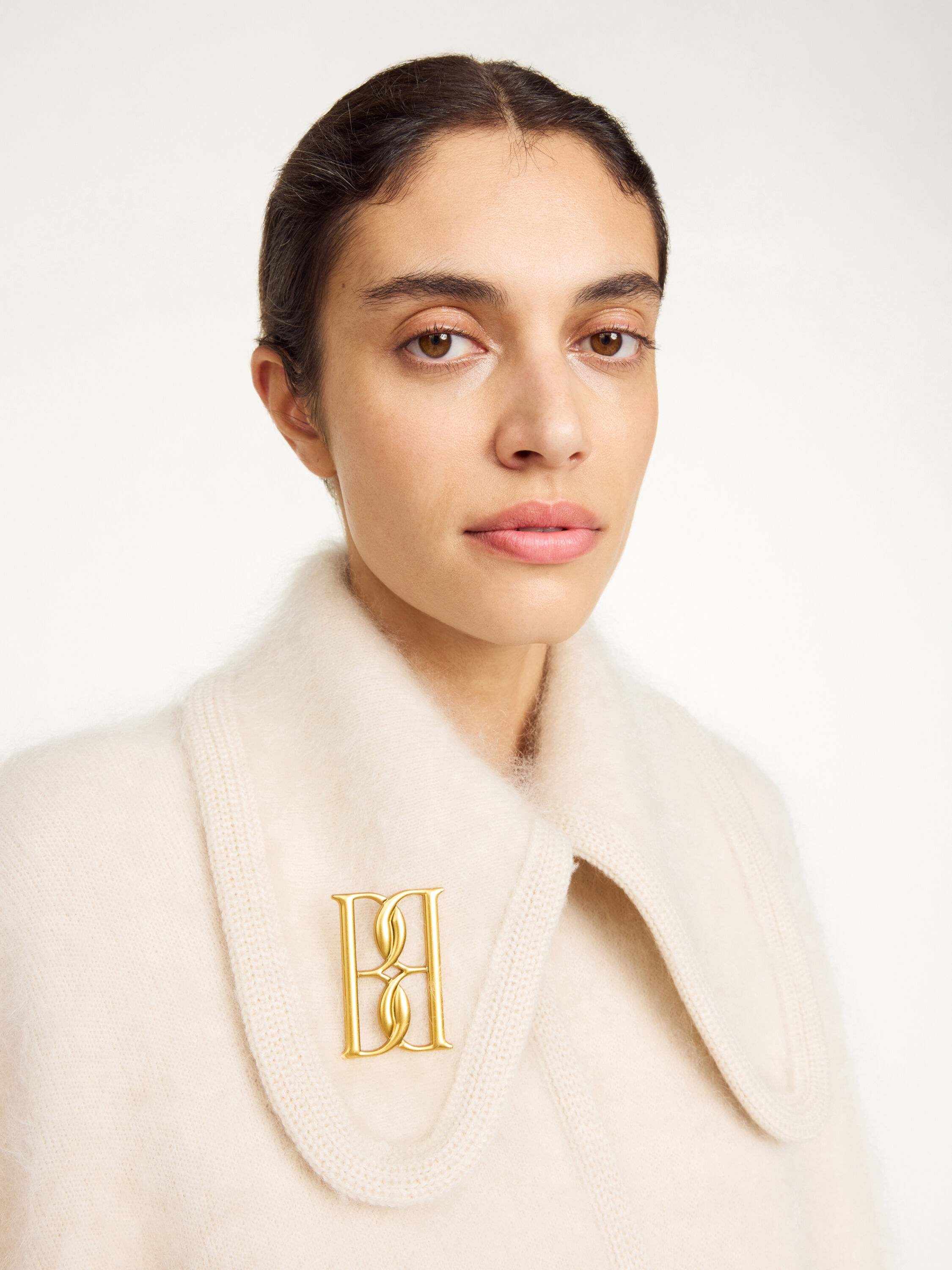 Mono large gold-tone brooch