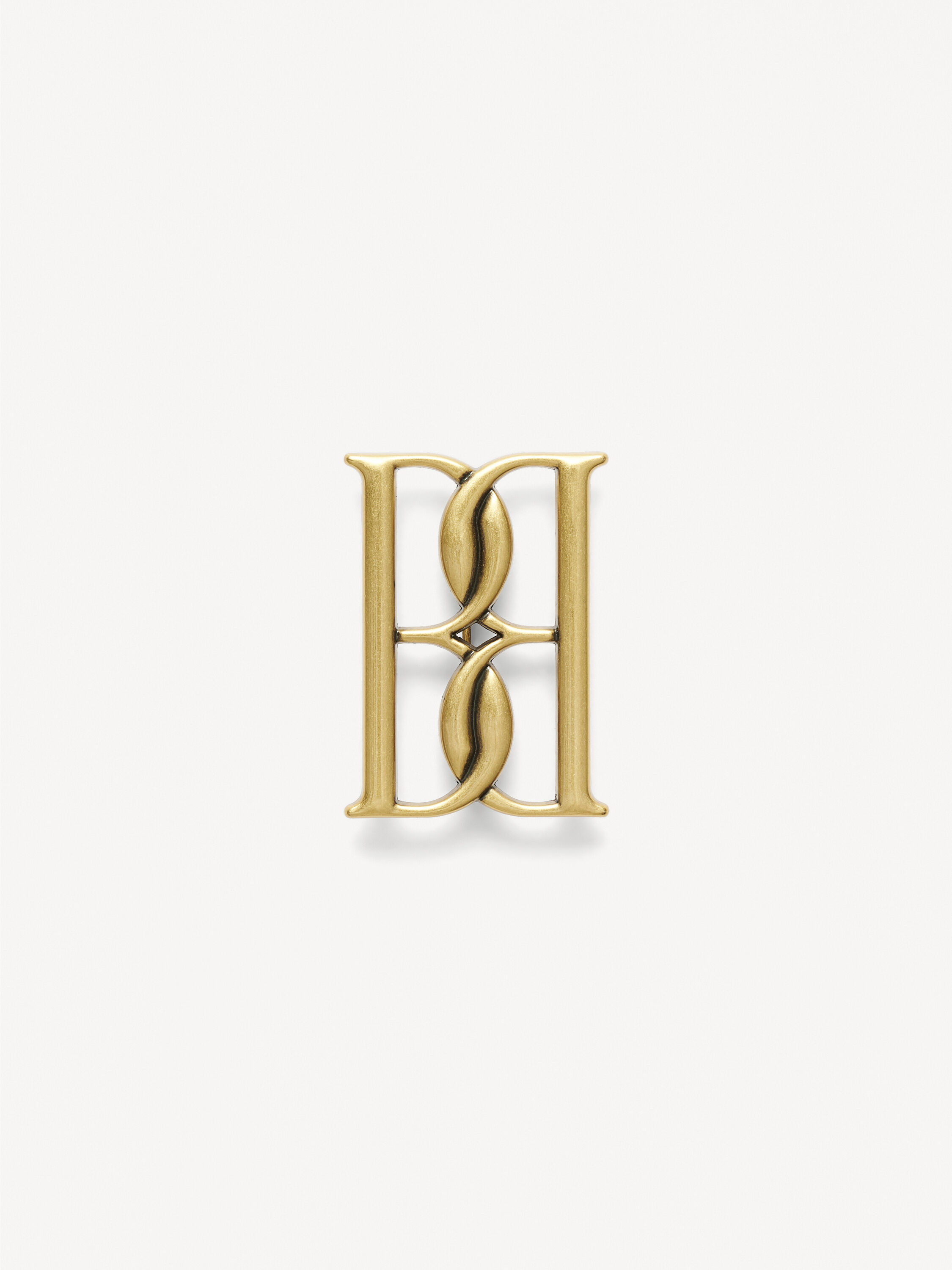Mono small gold-tone brooch