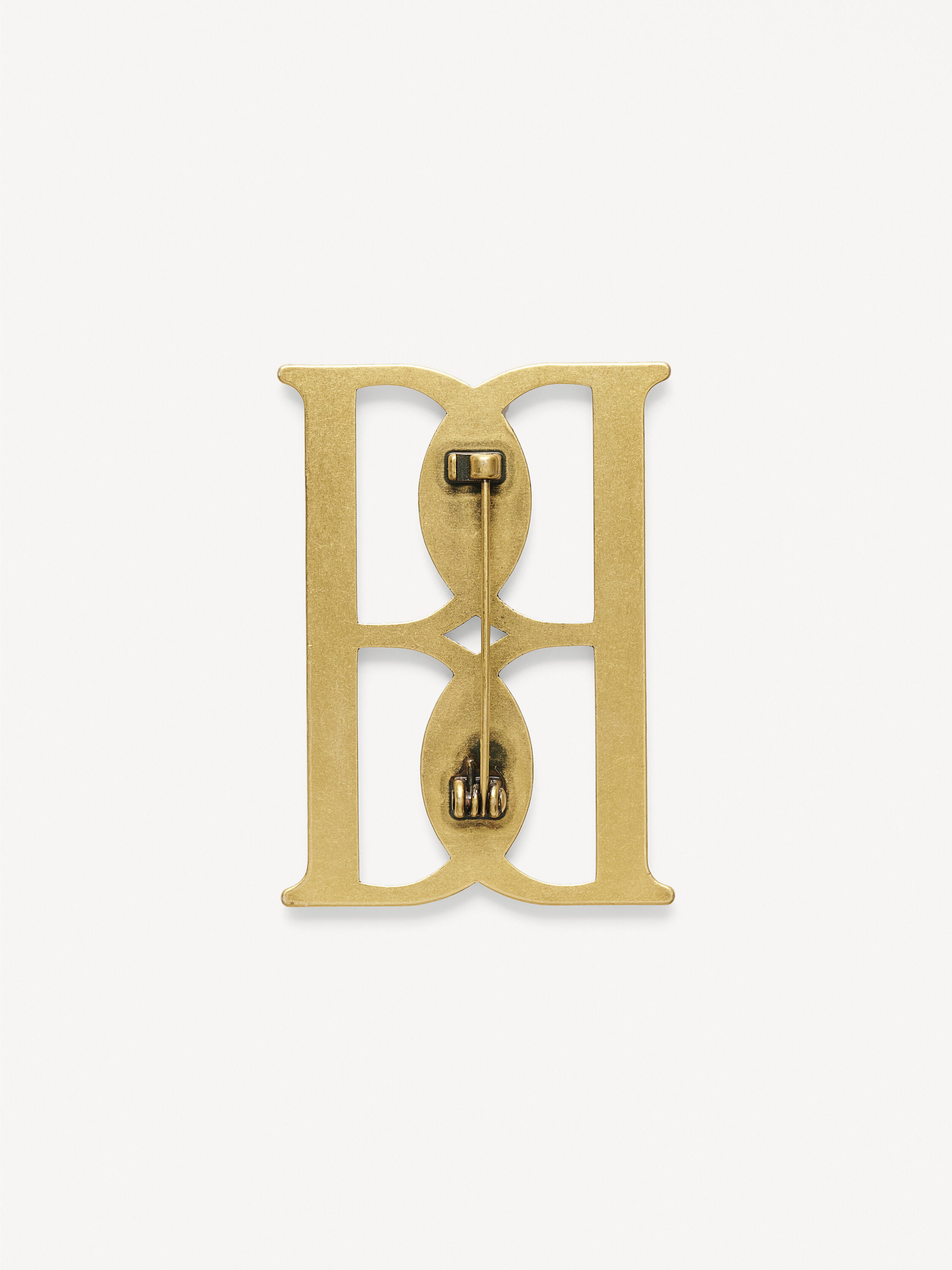 Mono large gold-tone brooch