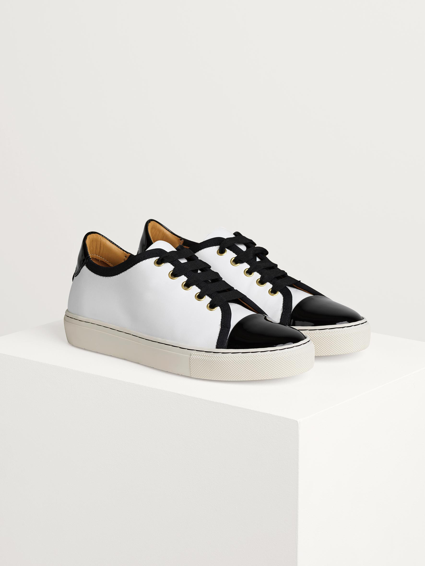 sneakers with rubber toe cap